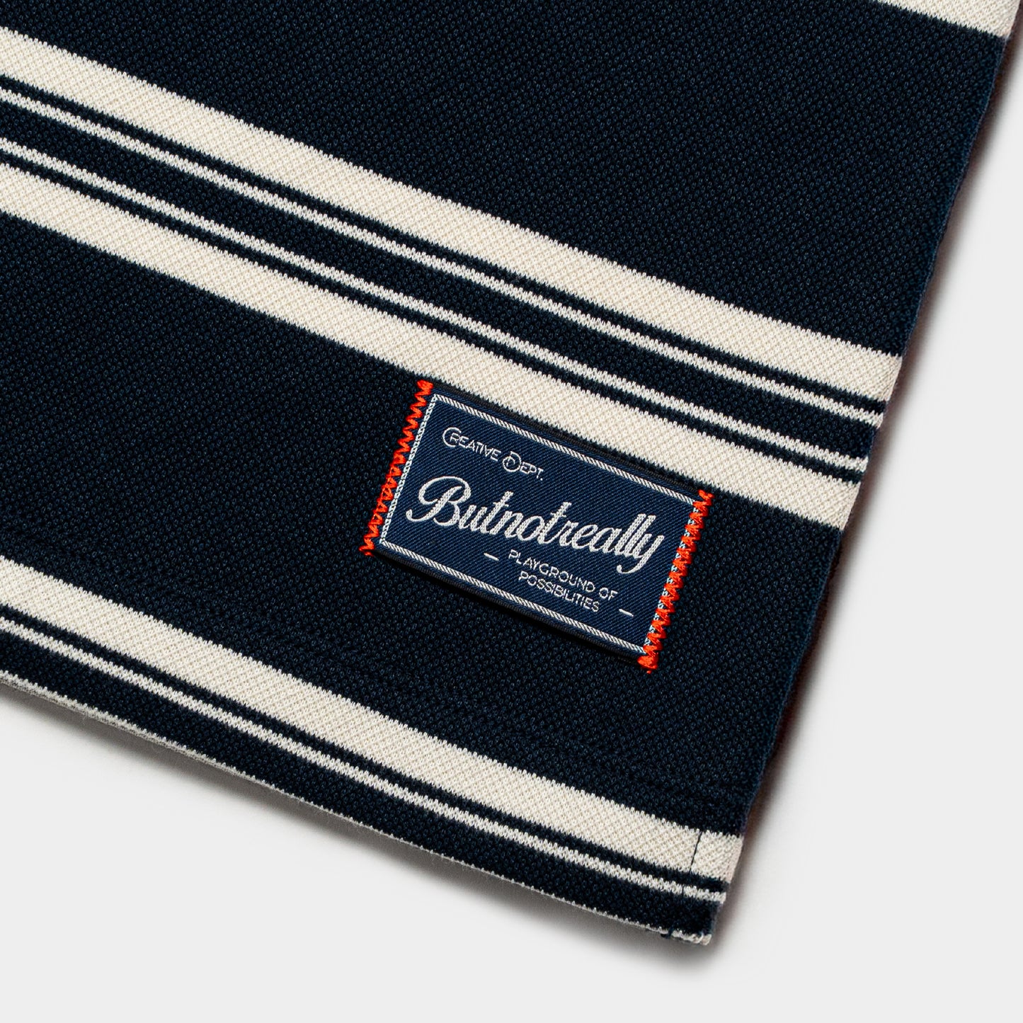 ButNotReally™ Interlock Stripes Polo Tee