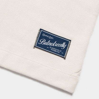 ButNotReally™ Graphic Interlock Oversized Polo Tee