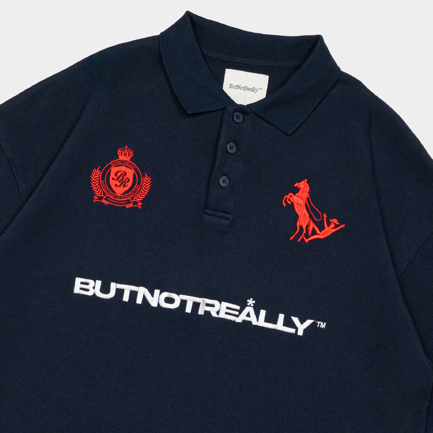 ButNotReally™ Graphic Interlock Oversized Polo Tee