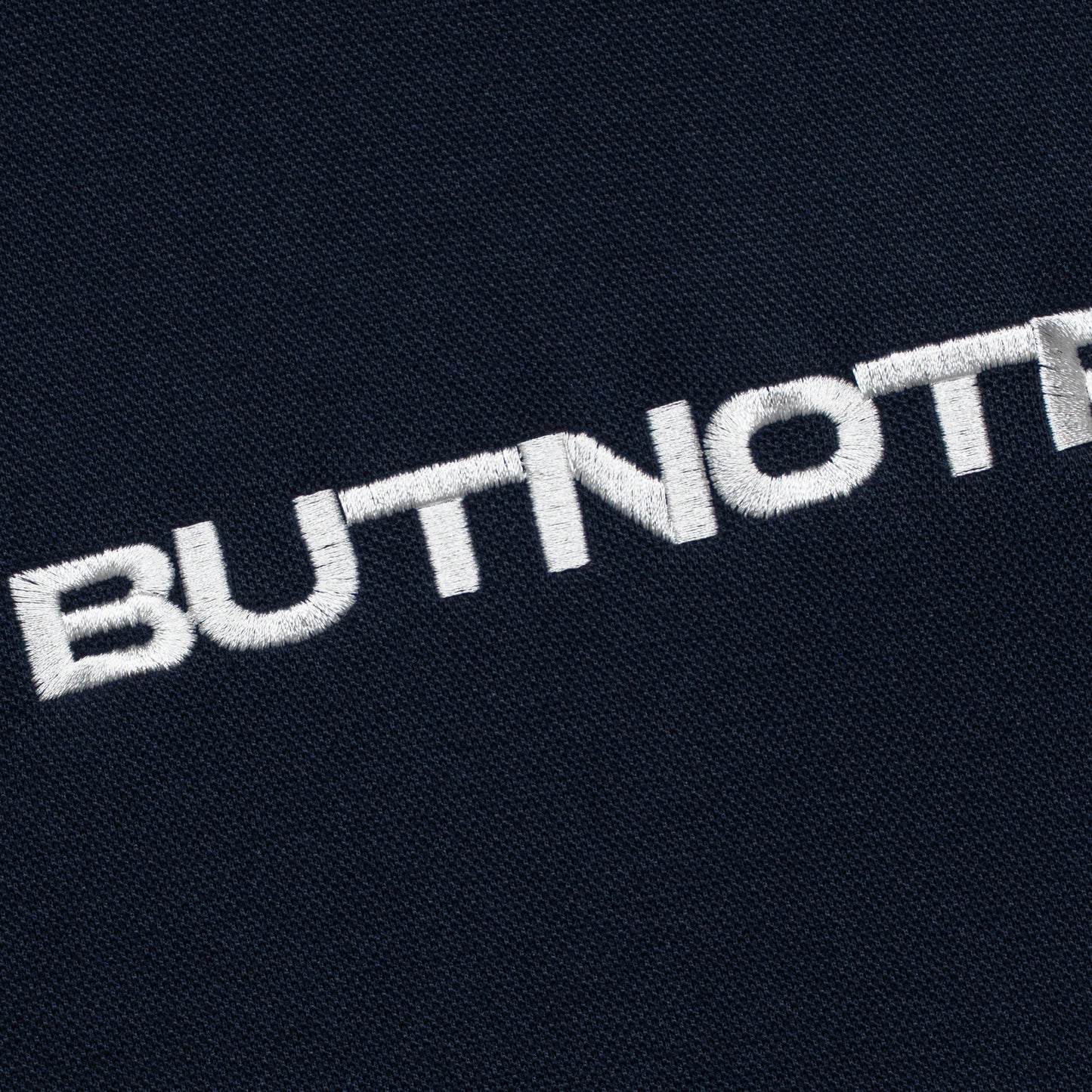 ButNotReally™ Graphic Interlock Oversized Polo Tee