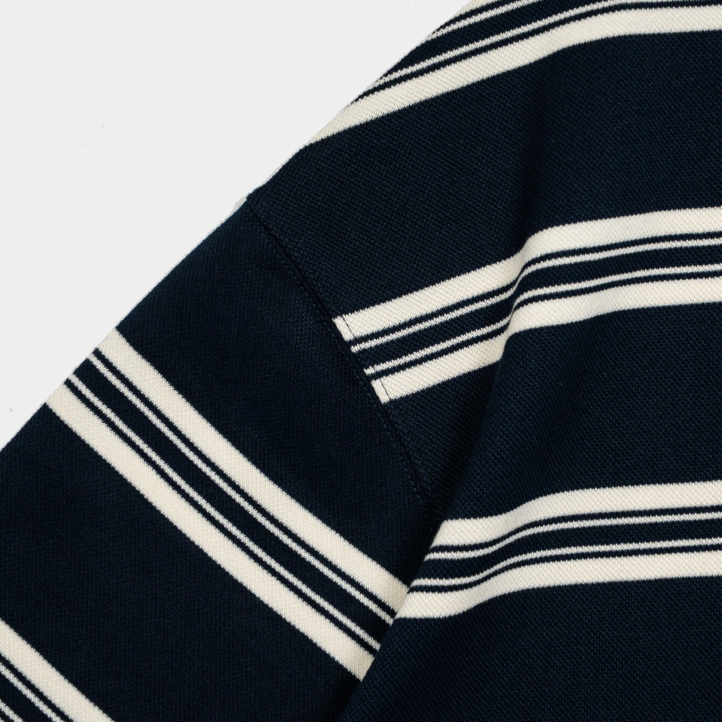 ButNotReally™ Interlock Stripes Polo Tee