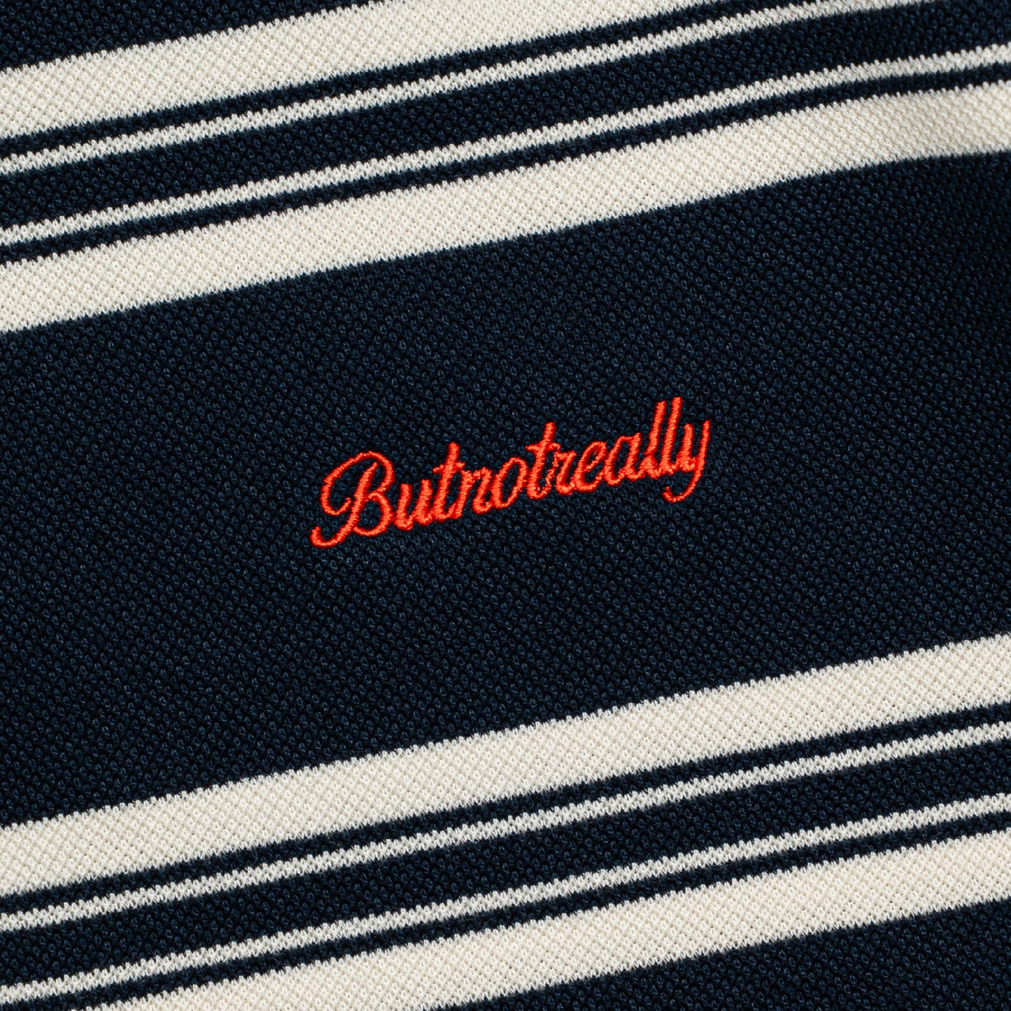 ButNotReally™ Interlock Stripes Polo Tee